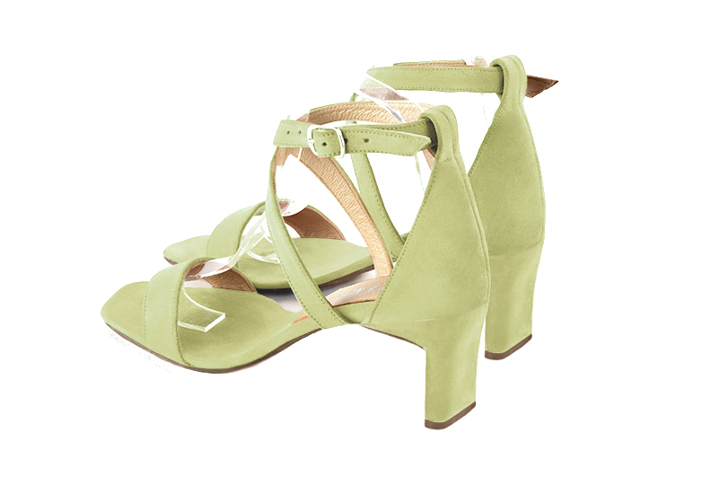 Women's  elegant sandals closed at the back with crossed straps. .  - Rear view